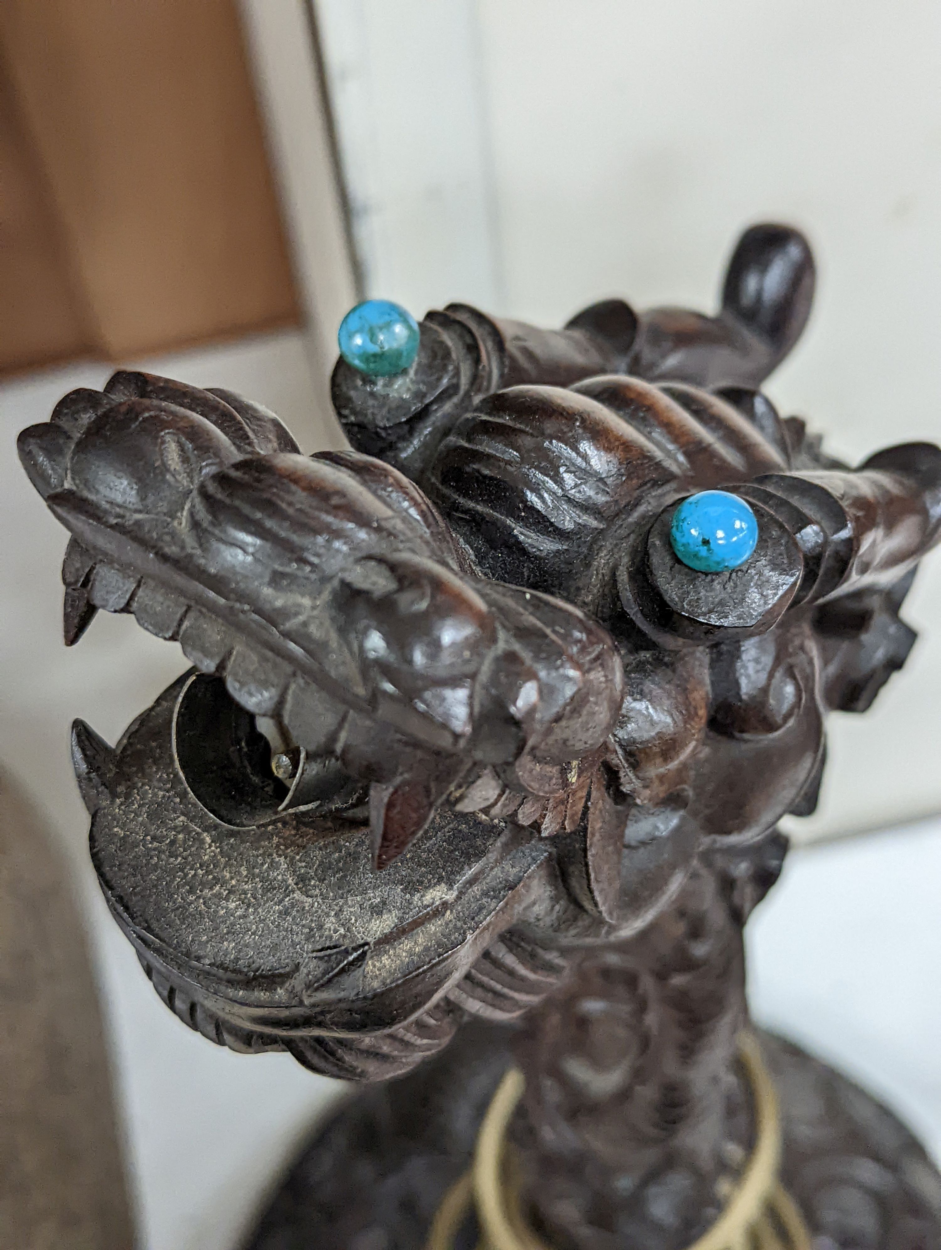 A pair of Chinese carved hongmu dragon lamps - 40cm tall